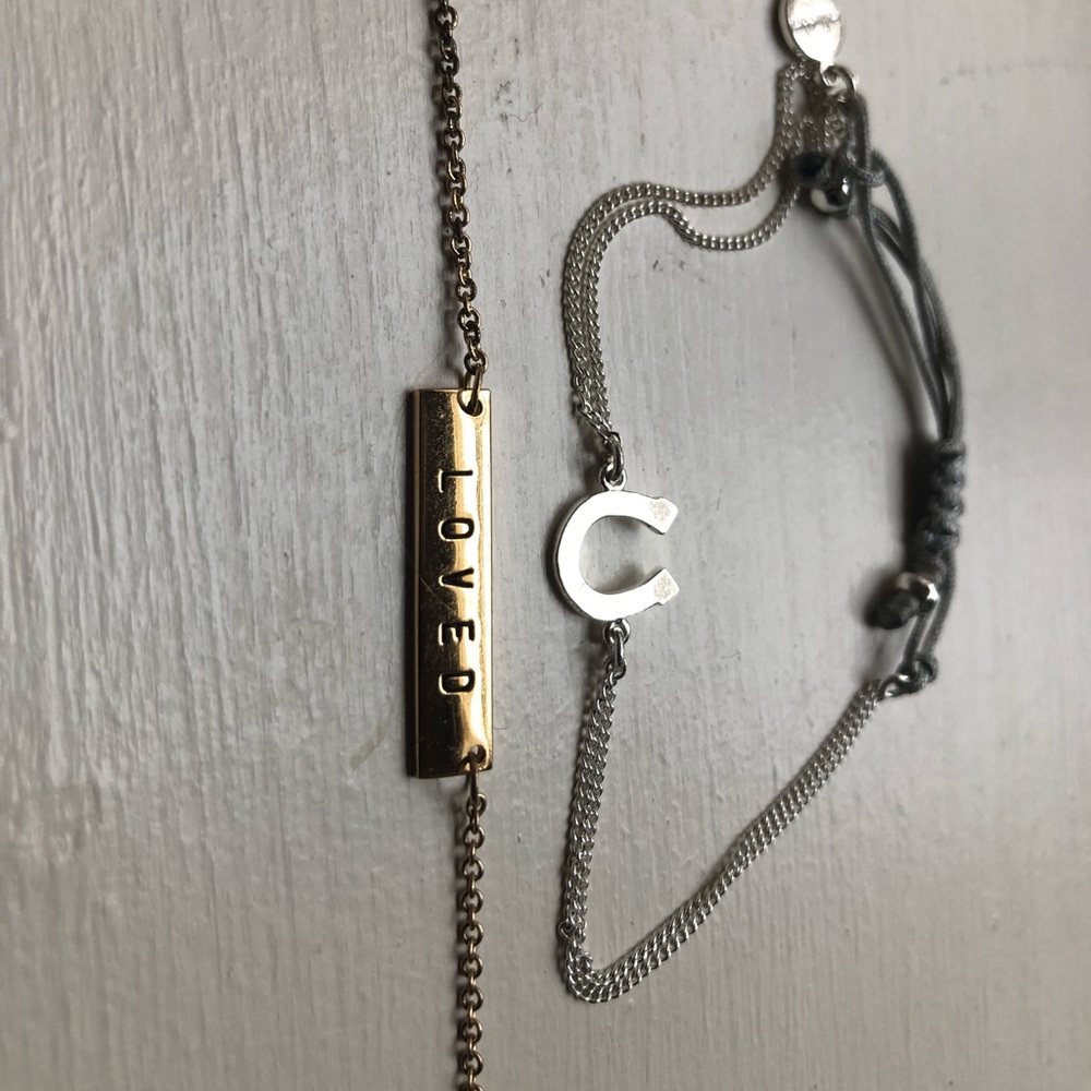 loved necklace and horseshoe bracelet